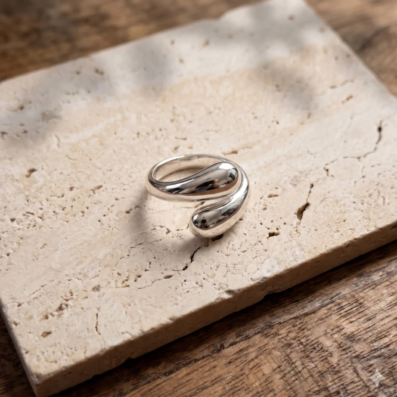 Polished_silver_wrap_ring_with_202606251029.jpeg